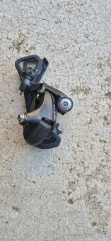 Přehazovače a páčky Sram, Shimano - 8