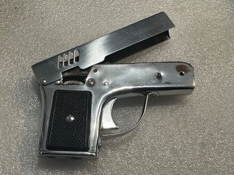 Prodám starý, plně funkční zapalovač s bleskem “pistolka” - 8