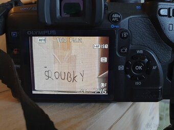 Olympus E-520, dva objektivy, dvě baterie, batoh, karty. - 8