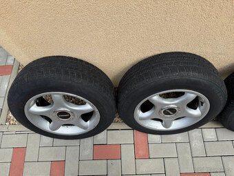 Alu kola Zender 15" 4x100, 7Jx15 ET35, zimní pneu 185/65/15 - 8