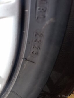 Zimní 235/55 R17 s ALU Audi 8Jx17 ET43 - 8