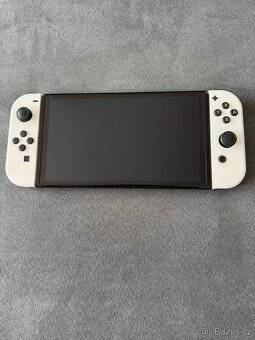 Prodám Nintendo Switch OLED + 3hry - 8