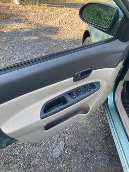 Hyundai Accent 1,4/71 kw - 8