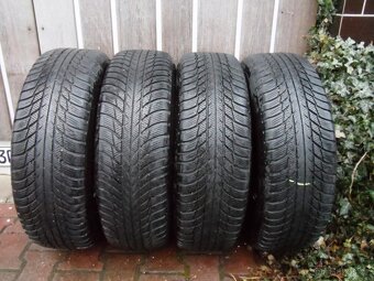 Komplet Zimní Sada Poklice Bridgestone 215/65/17 ET 38 5x112 - 8