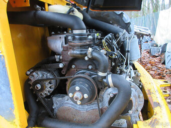 Kolový nakladač JCB 407 - 8