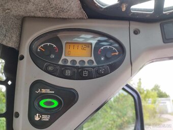 Šmykový nakladač Bobcat S100, TP. - 8