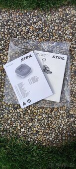 Rychlonabíječka a akumulátor STIHL - 8