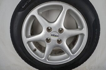 Ford Focus - 15" alu kola - Letní pneu - 8