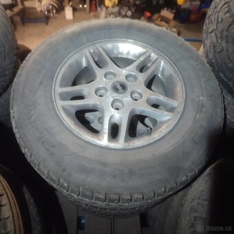 Prodám sadu ALU kol rozteč 5x127 na Jeep grand Cherokee wj - 8