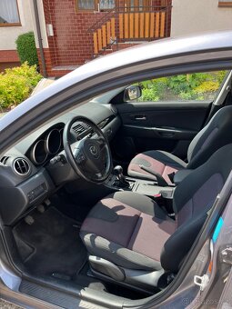 Mazda 3 1,4 - 8