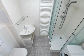 Prodej bytu 1+kk Praha Východ - 8