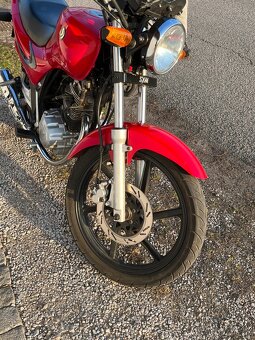 Sym xs 125 k - 8