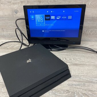 PlayStation 4 PRO 1 TB + bílý originální ovladač – výborný s - 8