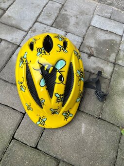 Cyklistické helmy - různé velikosti a motivy - 8