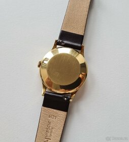 Zlaté náramkové hodinky IWC Schaffhausen Automatic 18K
- 8