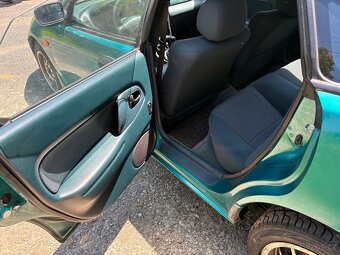 Mazda 323F BA 1.8 - 8