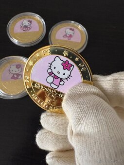 Prodám kovové mince s motivem Hello Kitty - 8
