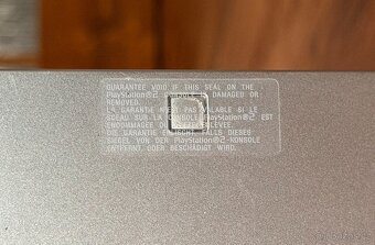 Sony Playstation 2 Slim (SCPH-75004) stříbrná - 8
