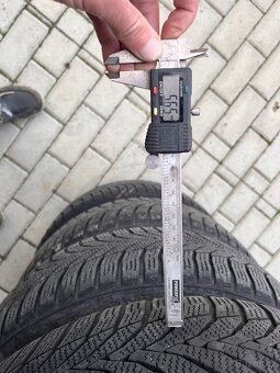 Sada zimnich kol Volvo Ford 215/50 R17 - 7Jx17 ET55 - 8