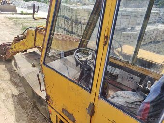 Kolový bagr DH 113 - 8