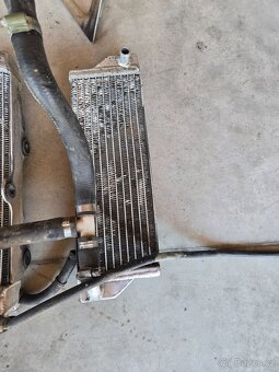 Chladiče a držáky Husqvarna 125 - 8