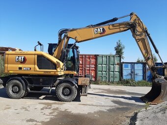 Kolový otočný bagr CAT M318 - 8