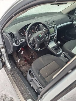 Škoda octavia 1.6 Tdi 77Kw - 8