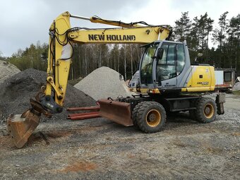 Prodám kolový bagr New Holland MH 5.6, 20,5 t, r.v. 2009, 8. - 8