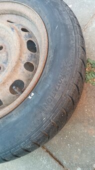 Zimní pneumatiky 175/65 R14 82T a plechová kola - 8