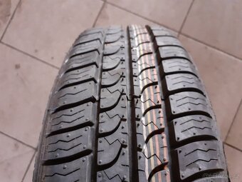 rezervní kolo Opel 5,5x14 - 8