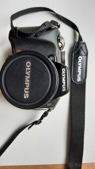 Olympus SP-560 UZ - 8
