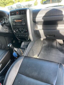 Suzuki Jimny 1.3i. Facelift 2013 - 8