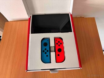 🎮 Nintendo Switch (OLED model) – Neon Blue / Neon Red - 8