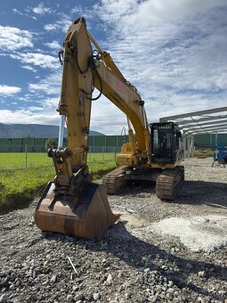 Pásové rypadlo Caterpillar 325D - 8