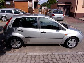 Ford Fiesta 1,25i 16V 55kW, provoz 2004,po maj.r. 1936 - 8