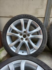 Lehké slitinové originální disky a letní pneumatiky  Mazda 6 - 8