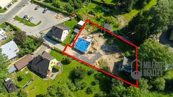 Prodej stavebního pozemku s projektem na RD 1 036 m², Nové M - 8