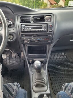 Toyota Corolla 1.6 16V Si | 84 kW | E100 | 1993 - 8