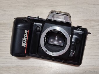 REZERVACE / Kinofilm zrcadlovka Nikon F401 + Tamron 28-200 - 8
