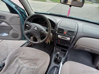 Nissan almera 1.5i benzin 66kw r.2003 stk 2026/5 - 8