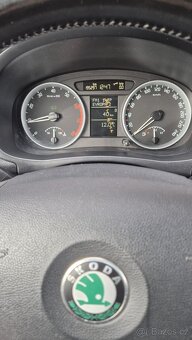 Škoda Fabia II Combi 1.2 HTP Elegance - Climatronic - 8
