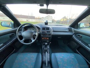 Mazda 323f - 8