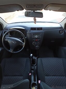 Daihatsu Cuore VII (L275) 1.0 - 8