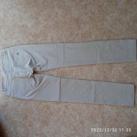 Dámské kalhoty italské značky Rinascimento velikosti S - 8