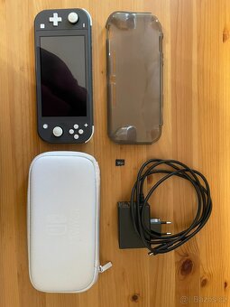 Nintendo Switch Lite + 64Gb karta - 8