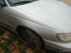 Opel omega b, 2.6 díly - 8