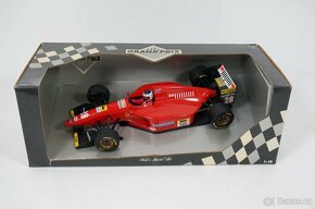 modely F1 1/18 Minichamps, Hotwheels Onyx  - Ferrari,McLaren - 8