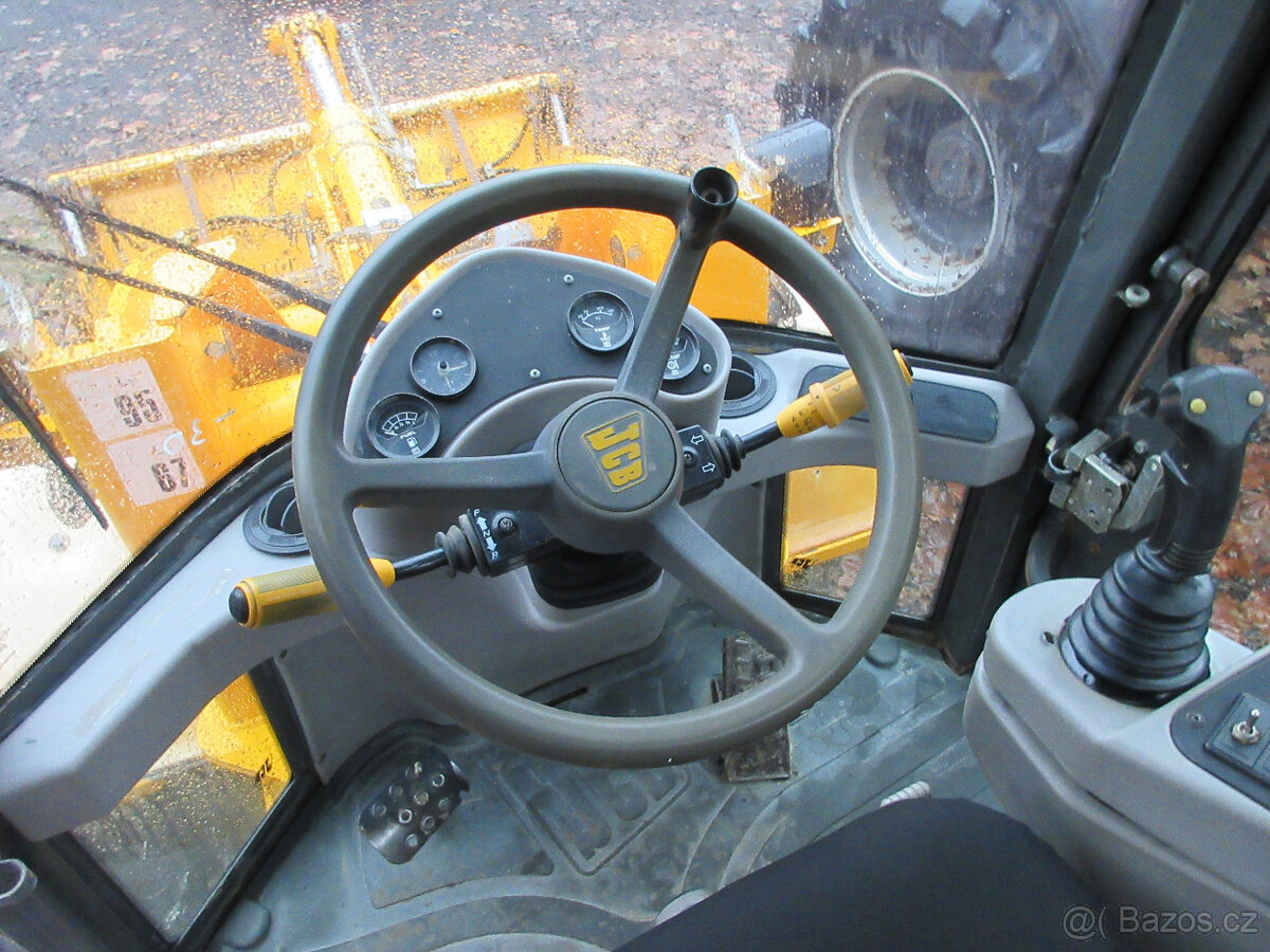 Kolový nakladač JCB 407 - - 9