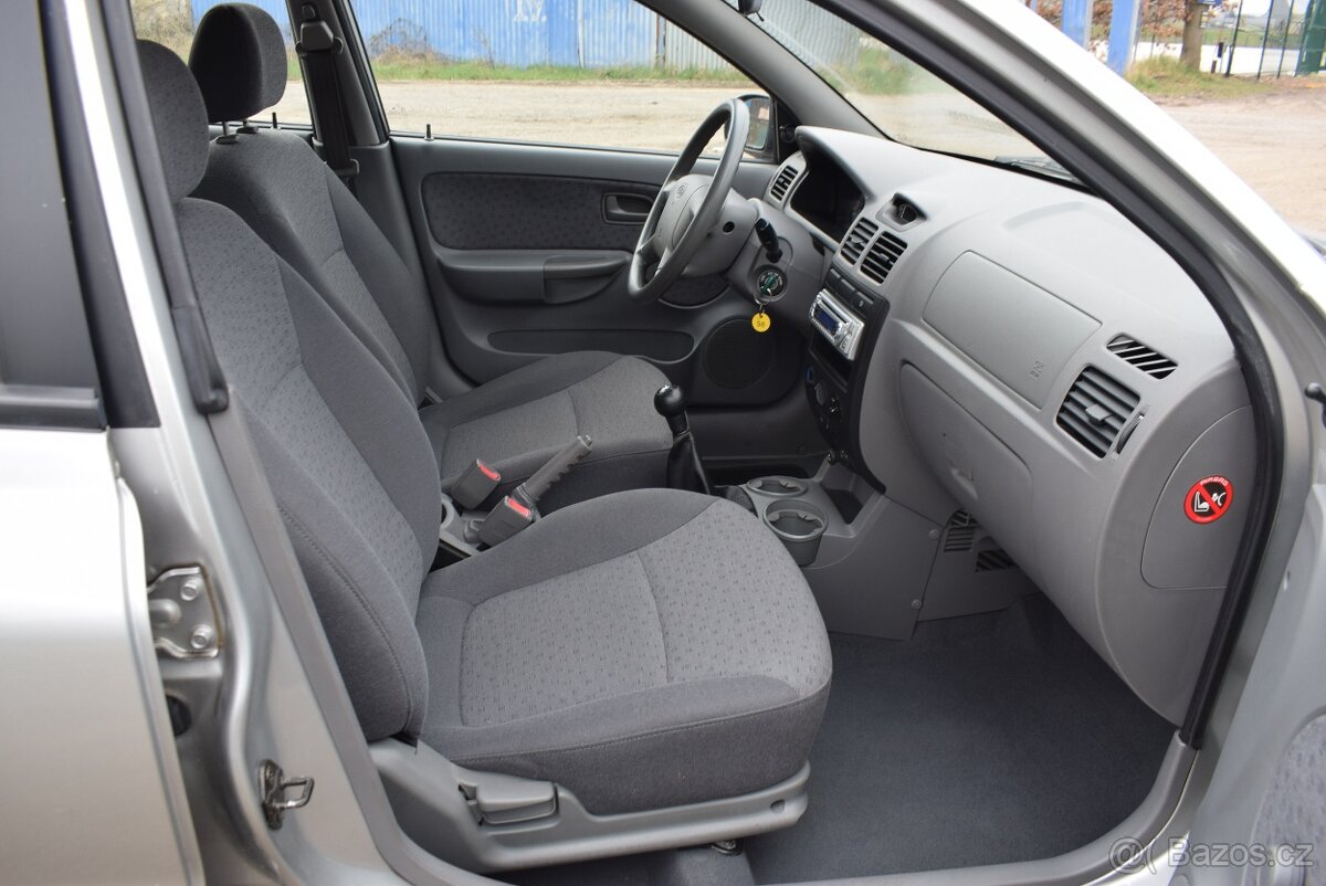 Kia Rio 1,3i SUPER STAV,PO SERVISU - 9