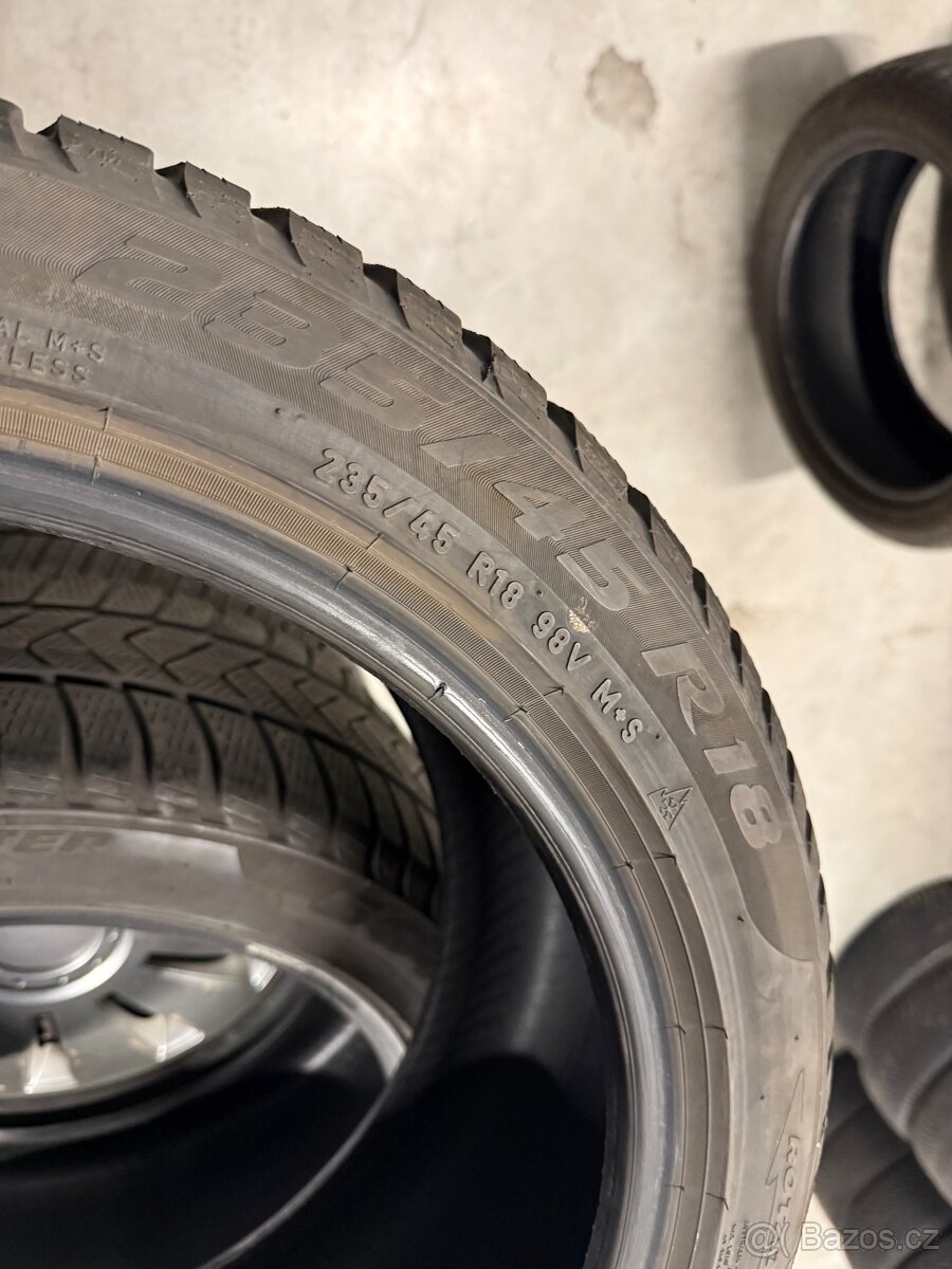 prodám zimní 235/45/18 Goodyear a Pirelli - - 9
